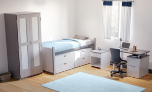 Room with bed, dresser, and desk from the Urban Collection